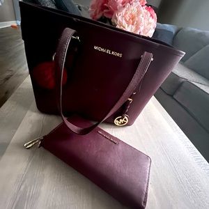 Maroon Michael Kors purse and wallet set